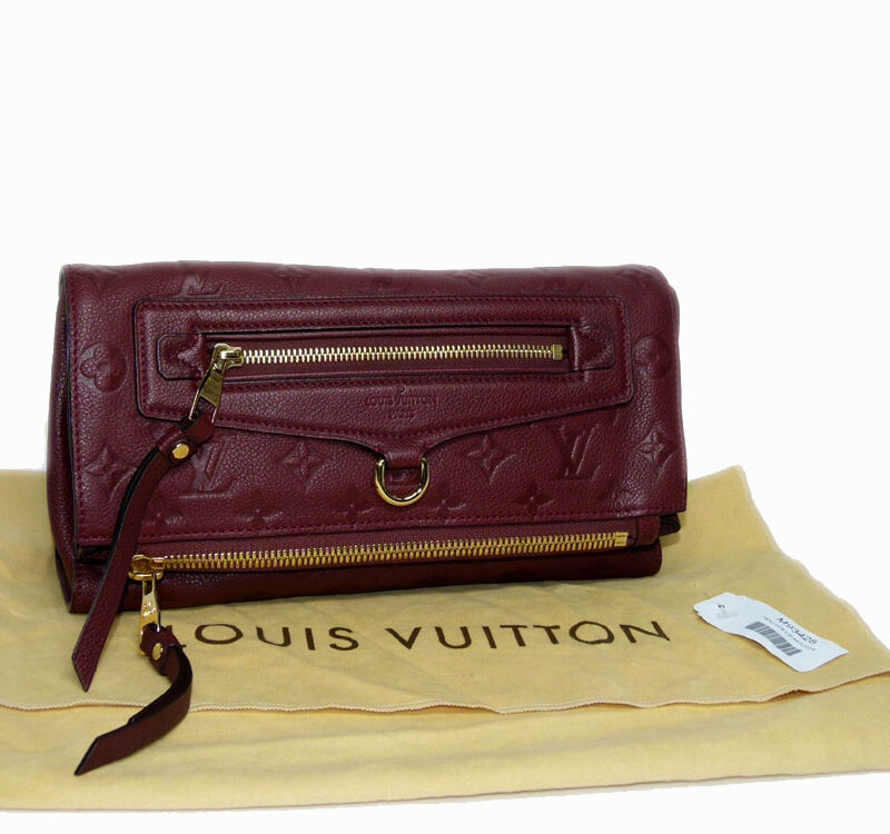Louis Vuitton M93428 Monogram Empreinte Aurore Petillante Clutch-0
