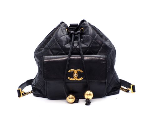Chanel 1994 Vintage Black Lambskin Timeless Drawstring Bucket Backpack Gold Hardware